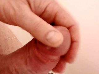 Making his stiff cum