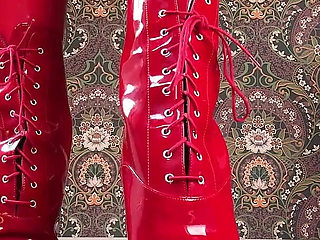Red Ballet Boots on Wooden Floor