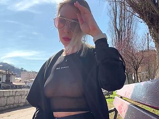 Public city walk in see-through top. Flashing tits to for