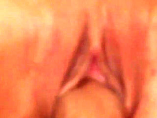 Brunette teen Nataly on the couch gets cum on her tits