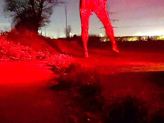 Wanking side of road In body stocking. Cars passing