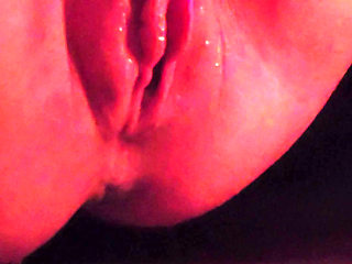 Muscular milf jerks off her big clit and pumps juice from horniness