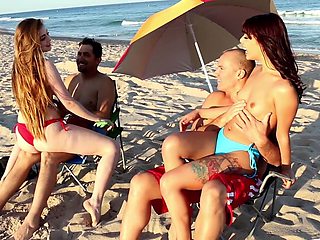 Naughty naturals Gina and Kobi join tattooed studs in a wild beach orgy