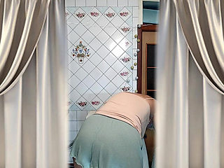 Hot Housewife Lukerya Dances in the Kitchen in the Morning.