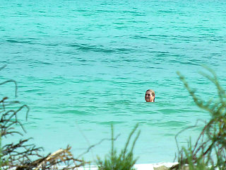 Watching on the beach as Isa has fun