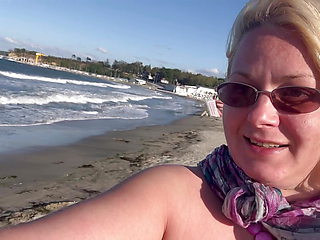 Walking, running and pissingtopless on the public beach