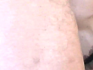 MILF with Sunglasses Gives a Blowjob and Gets a Cumshot in Her Mouth