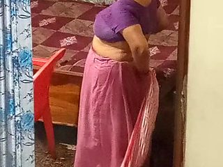 Aunty caught red handed on camera while changing dress.