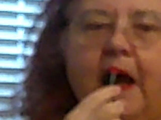Mature BBW Redhead Nurse Vicki Talks to You as She Makes a Lipstick Applying Video for You!
