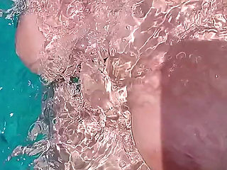 Swimming in the blue waters of Greece butt naked...
